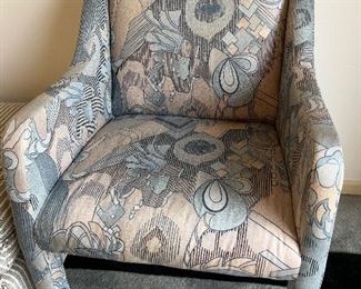 Pair of directional arm chairs