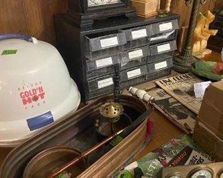 clocks, bing crosby memorabilia. hairdryer, storage cabinet