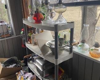 hurricane lamps, irons, radio, air conditioner. stainless steel pots pans, flexible flyer