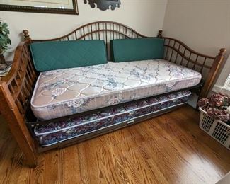 Day bed . Second bed pulls out and extend up to same height as 1st bed.