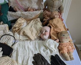 Old dolls and doll clothes
