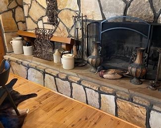 Fireplace mantle, pottery crocks