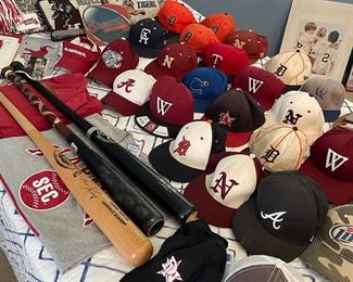 Ball cap collection & signed bat by Juan Pierre