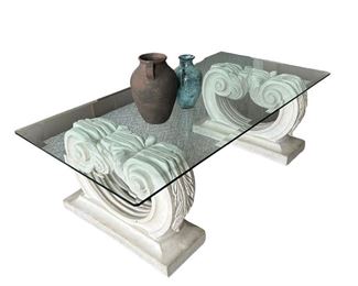 Glass coffee table with stone pedestals