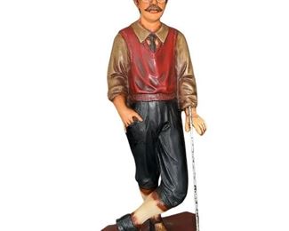 Statue: Golfer in red vest