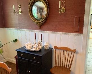 Bullseye mirror, brass sconces