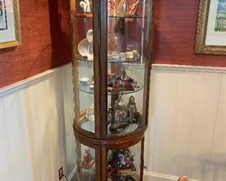 Round curio cabinet lighted