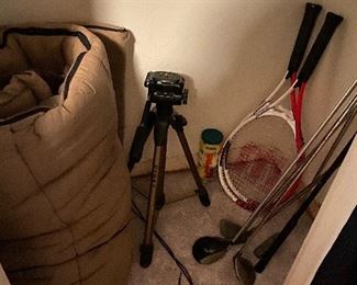 Sleeping bag, camera mount, golf clubs & tennis rackets. 
