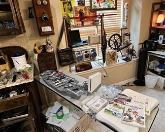 A Nintendo wii with Mario kart and board… an aircraft carrier loaded down with a metal planes collection.