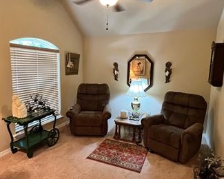 2 fully functional power-lift chairs / recliners… they go all the way totally flat like a bed, but will also lift up off the ground to help you stand up…. These are a literal life-changer for people with bad back problems!