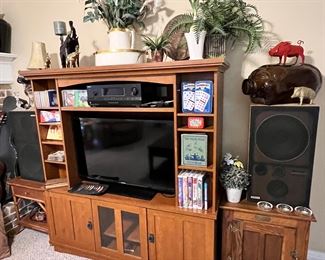 Really nice large entertainment center with storage & shelves!