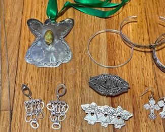 Top left angel is “signed” but not marked… think it might be silver. Not sure. Other pictures items are all marked silver.