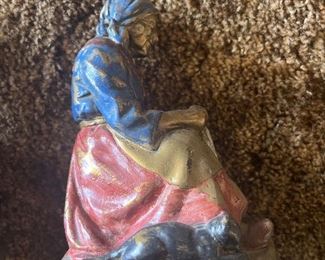 side of the figurine