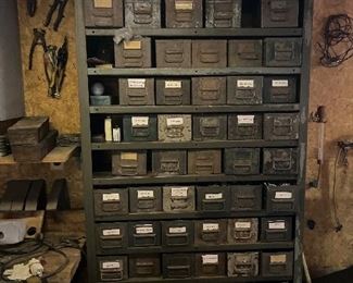 coolest steel shelving unit, and tons of little steel boxes... they are just so neat