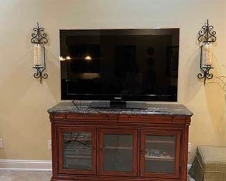 Buffet/ media cabinet with marble top
Flat screen TV