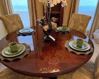 Stunning round Dining table with 4 curved leaves to keep it round and 4 parsons chairs


Paula Dean casual china