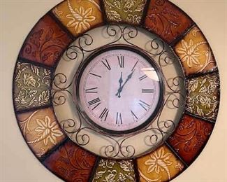Large clock with metal accents