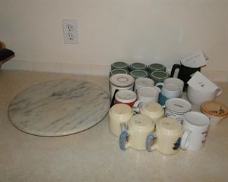 Mugs and marble lazy Susan