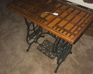 Price $175.00  -  Antique Early "Domestic" treadle sewing machine, cast iron base, late 1880's .  Wooden table measures 32"W x 28"H x 16.5"D with removable glass top for small treasures.   