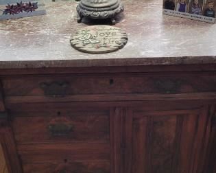 Nice old cabinet with drawers and a door.  Marble top