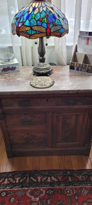 Nice old cabinet with drawers and a door.  Marble top