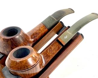 Vintage Hardcastle 140 Giant & Unsmoked Parker 374 Duke Briar Bent Smoking Pipes - Both pipes are vintage makes of London, England owned by Dunhill, and the two companies eventually merged in 1967. The Parker is unsmoked. The pipe stand is not included