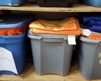 Buckets of orange tablecloths