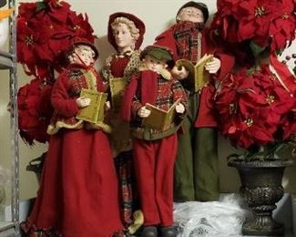 Carolers and poinsettia topiary
