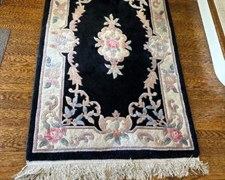 Tufted wool black and cream floral wool rug 70" x 42"