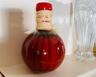 Decorative bottle of peppers