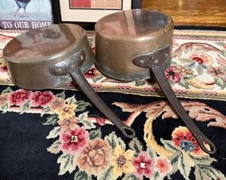 Pair of large copper pots