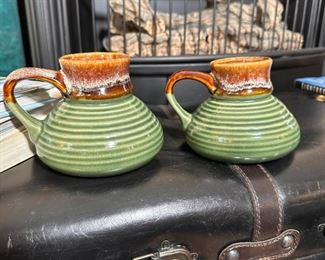 Brown and green pottery mugs