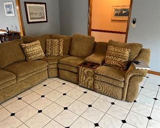 Lazy Boy Six piece sectional sofa with three recliners , storage and drink holders. It also has a pull out Hide-a-Bed. It is in great condition. 