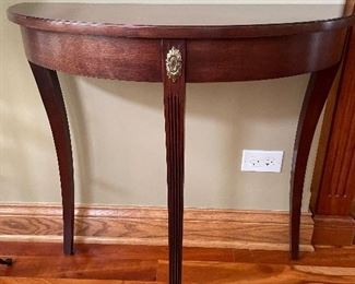 Demilune wood table, 30"W x 12"D x 30"H,  $115