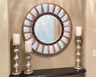 Black & Gold mirror, 34" diameter, $115.  Silver mercury glass candlesticks,  23"H, 19"H, 14"H,  $58