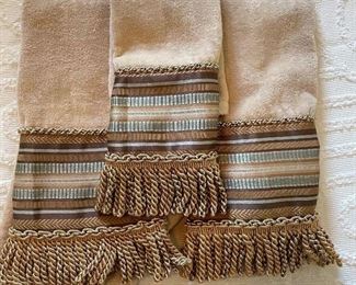 Beige and striped hand towels(2) and fingertip towel (1), $7