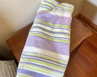 Purple and green striped throw, was $6, NOW $4