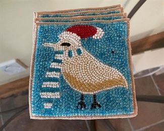 Beaded bird coaters (4),  $8