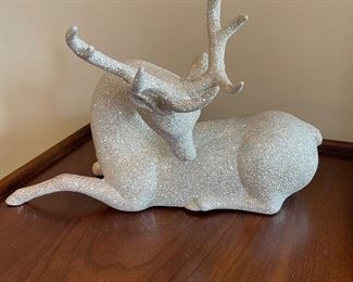 Sitting white glitter reindeer, 112"W x 9"H,  $14