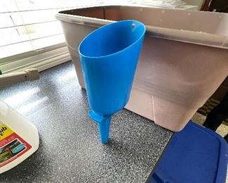 Blue cup w/ handle (used to scoop bird feed),  was $4, NOW $2