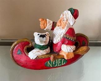 David Frykman Santa & Polar Bear in Canoe Figurine,  8" x 6", $25