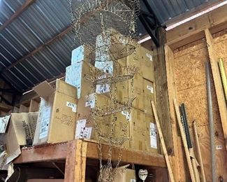 Many boxes of the one bulb chandeliers.  There is a picture of the chandeliers on display.   I did find two clear ones after we hung the colored ones.  