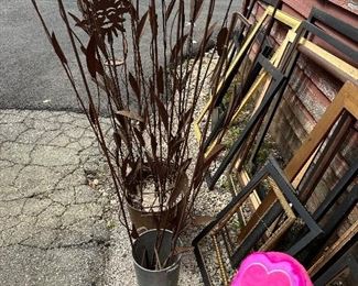 Flower stakes to hold your plant up or something for it to climb on.  