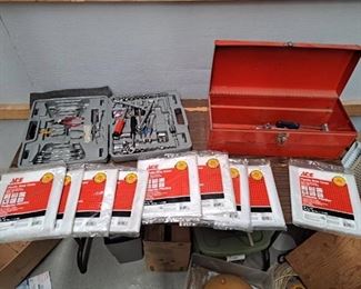 Assorted tools and plastic drop covers