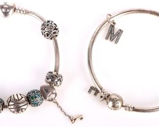 Genuine Pandora genuine sterling silver ladies charm bracelets. 