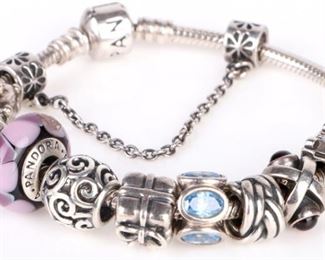 Genuine Pandora genuine sterling silver ladies charm bracelet