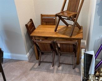 Antique child's desk and 5 folding chairs