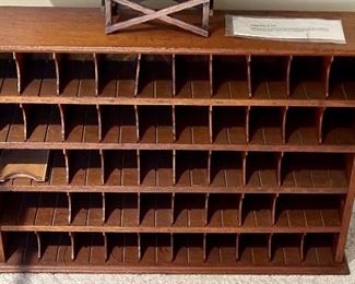 This is an Antique Card Catalog or Postal Sorter.