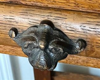 Check out this spectacular table.  The  lion heads and clawed feet make this antique a real collector’s ptece  and conversation table!  Perfect for a hall/Entry, Buffet or even Antique Bar.