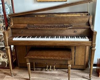 Piano by Kawai - btw the top comes off to give it the same rich sound as a baby grand, but without hogging all the space!  Made in Japan, Circa 1980's Model 202-M